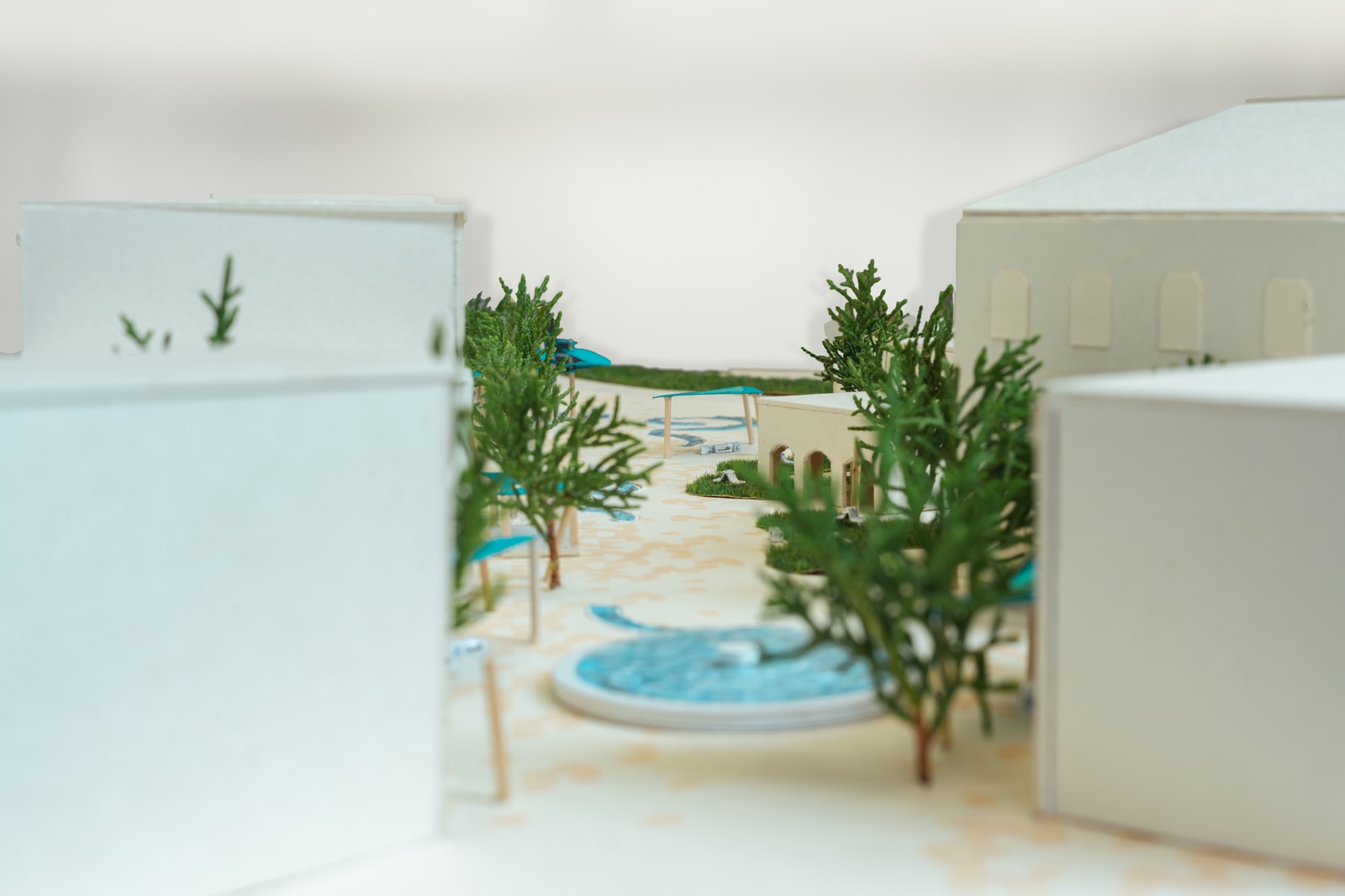 Physical scale model showing the fountain, planting and shaded structures from the opposite direction.