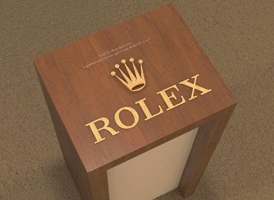 Detail render of the wooden activation pedestal, gold crown and Rolex lettering.